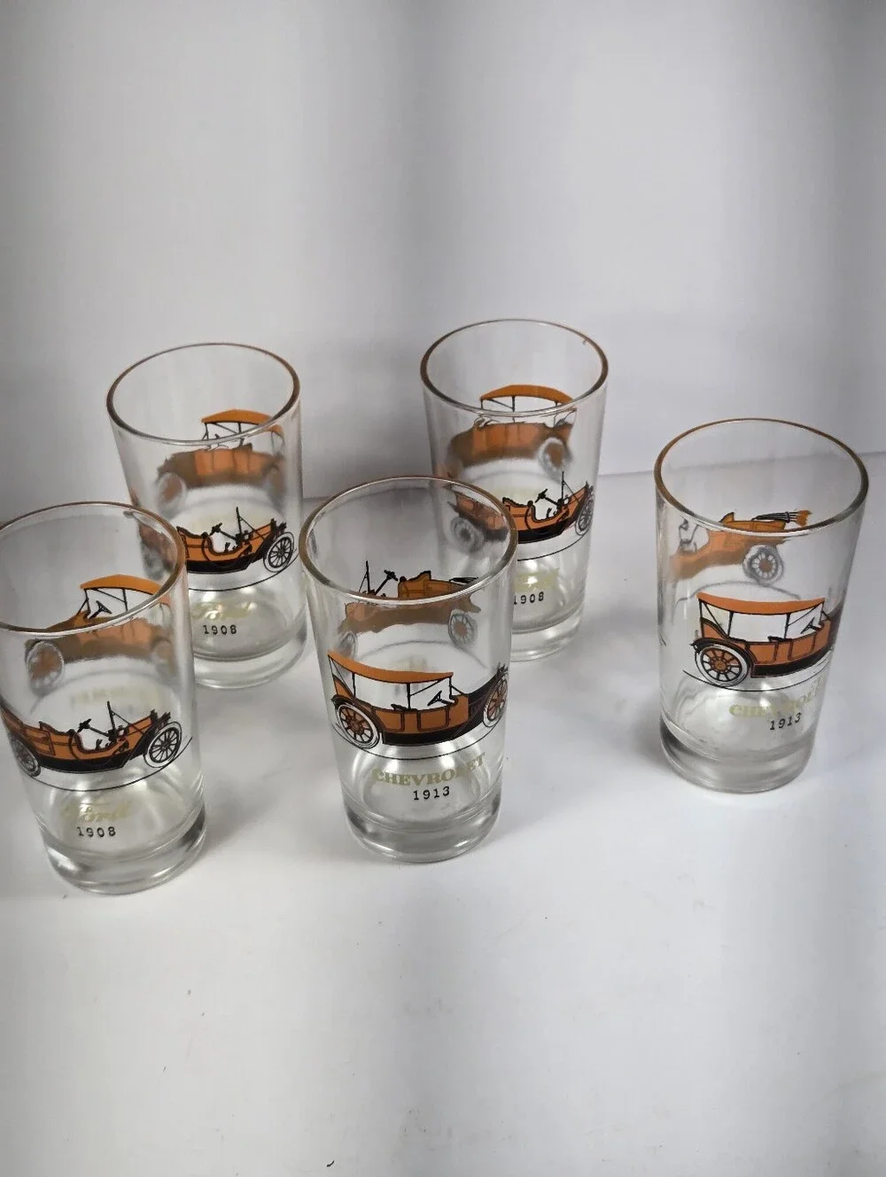 Vintage Atlas Glass Tumblers 1908 Mode T Ford and 1913 Chevrolet On Each Glass